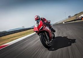 A picture containing motorcycle, road, track, ridingDescription automatically generated